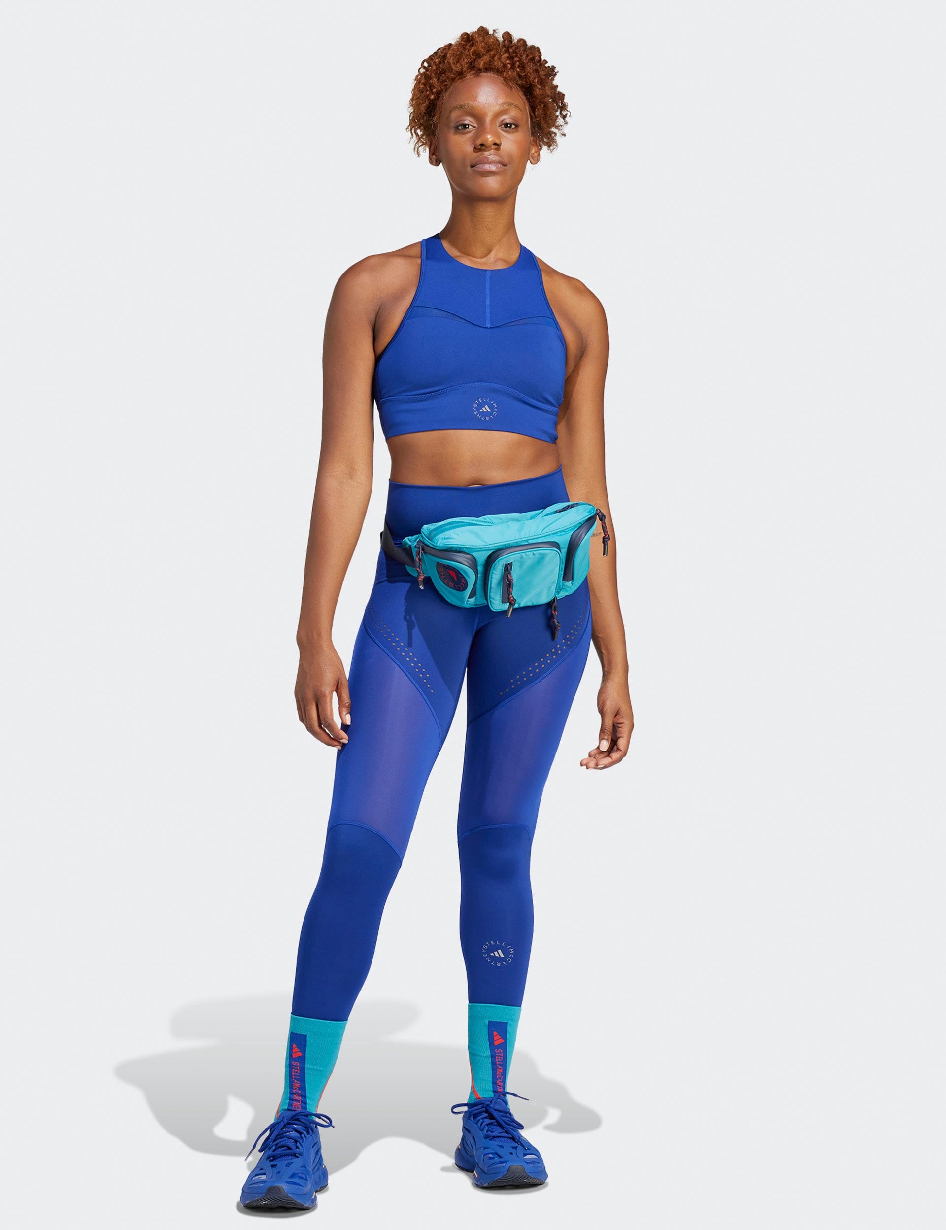 https://thesportsedit.com/cdn/shop/files/adidas-x-stella-mccartney-truepurpose-optime-training-7-8-leggings-mystery-ink-ib6797_5.jpg?v=1693395549