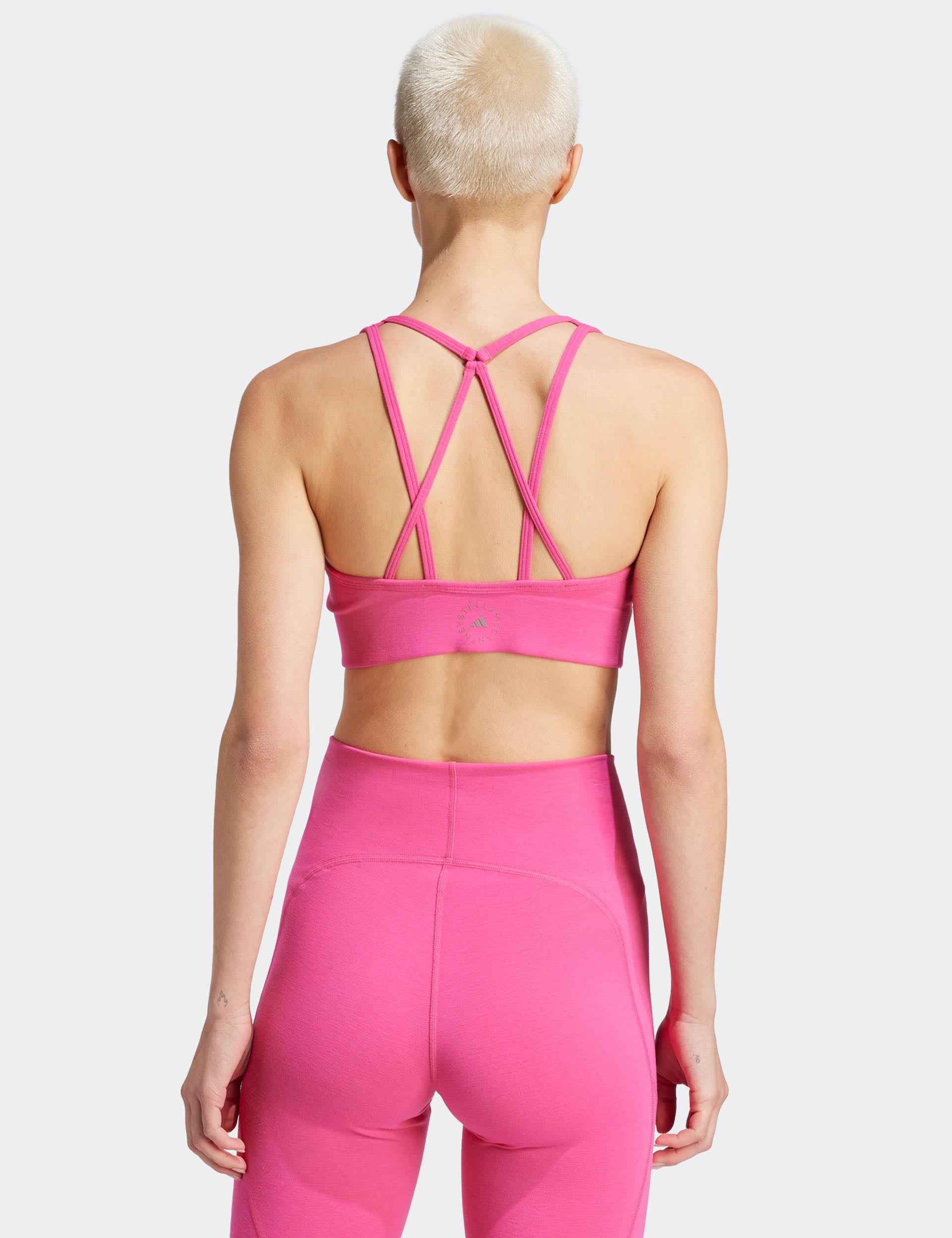 adidas by Stella McCartney True Strength Medium Support Bra in Semi Pink  Glow, Pink. Size L (also in M, S, XS).
