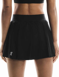 On Running | Court Skirt Pleated - Black | The Sports Edit